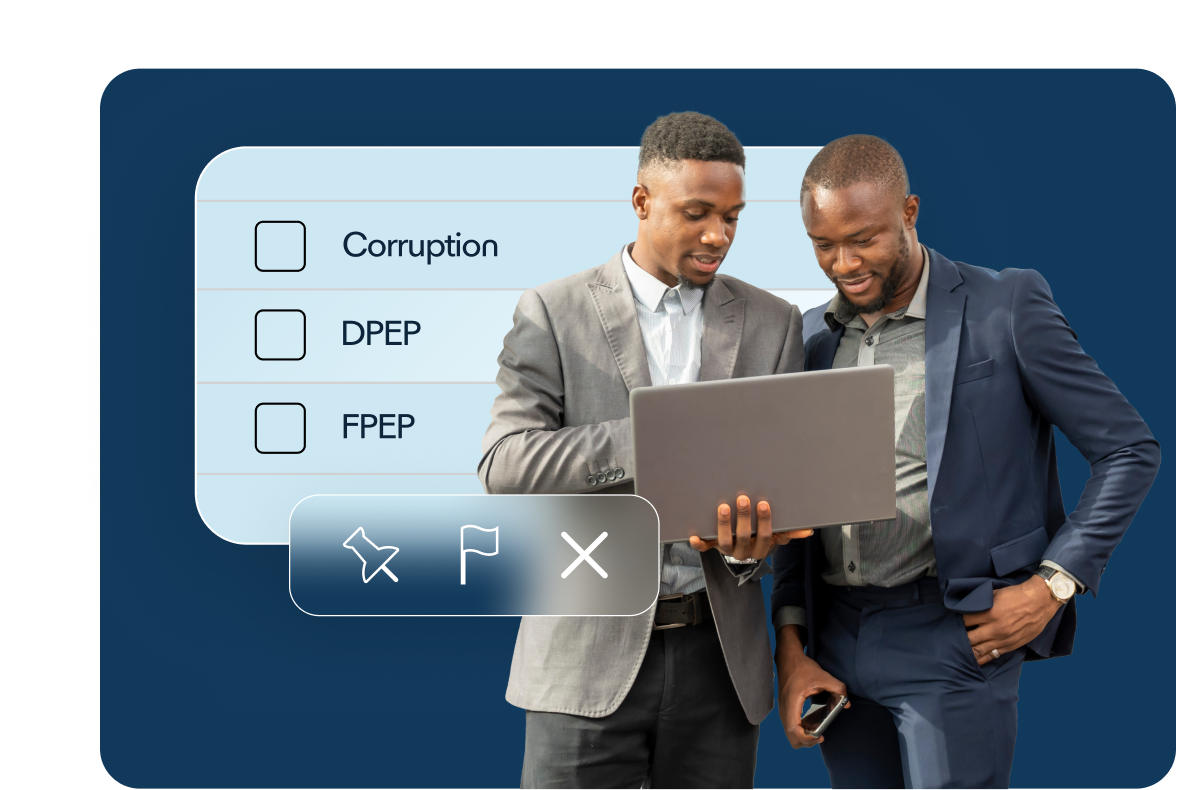 2 african man in suits looking at laptop