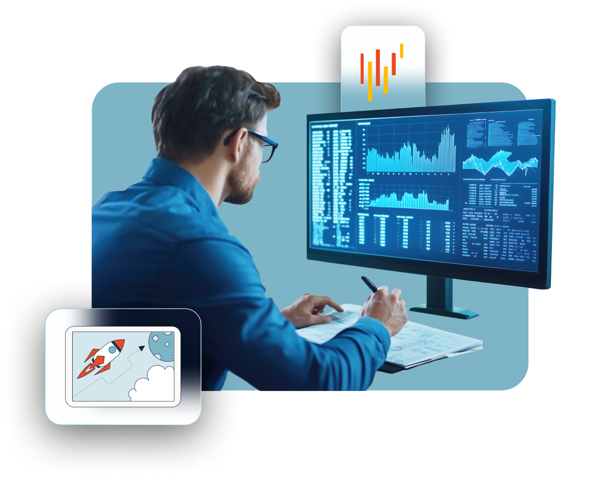 Man looking at monitor with graphs on the screen