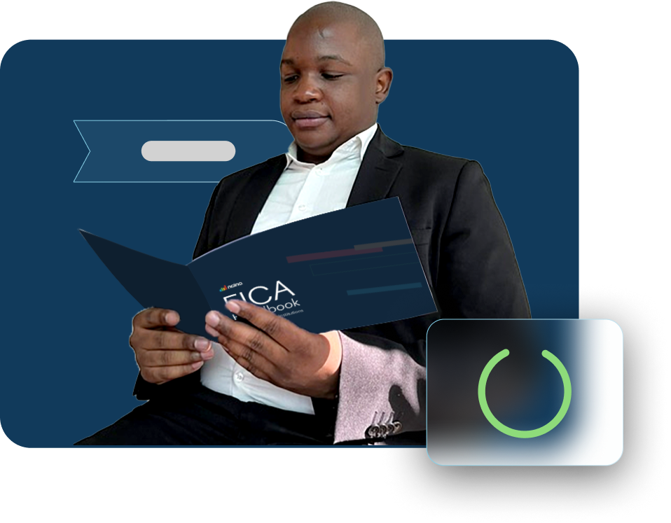 man wearing a suit reading FICA booklet