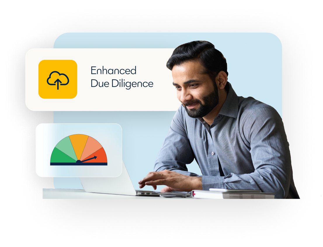 man working on laptop with the words enhanced due diligence behind him