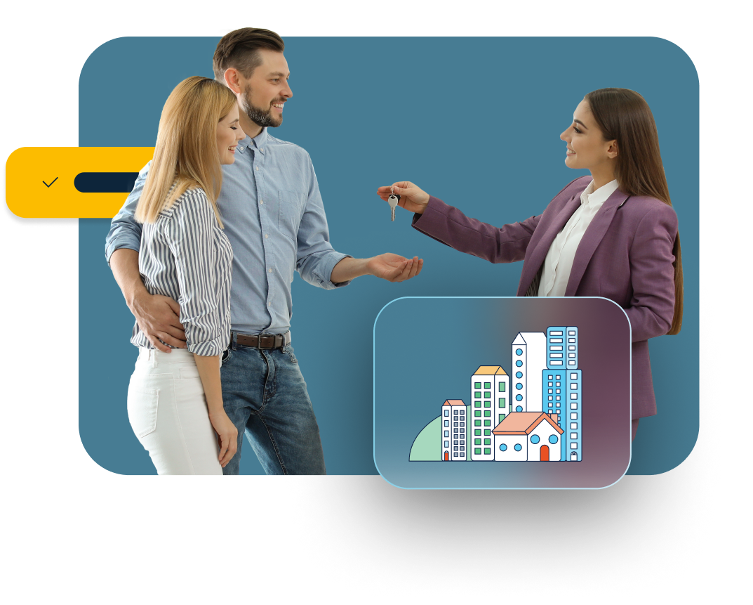 real estate agent handing over keys to a couple